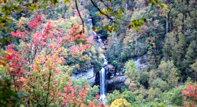 View of Raven Cliff Falls with fall foliage.