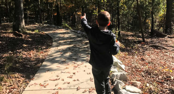 Child on the nature trail at Saddlers Creek State Park