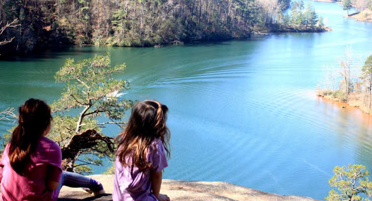 Two children looking out over Lake Keowee  at Keowee Toxaway State Park