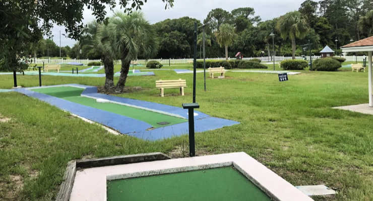 Mini golf course with palm trees