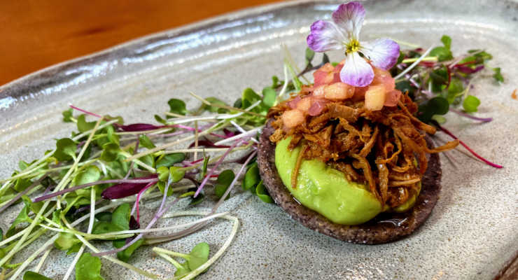 A plate from Camp GVL Tostada at CAMP restaurant Greenville