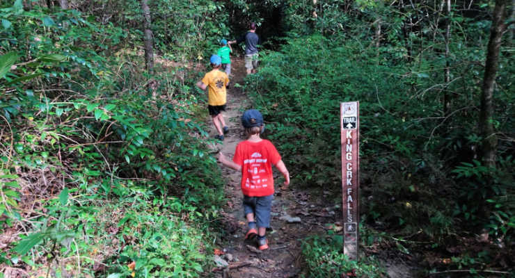 Kids hike the trail to King Creek Falls