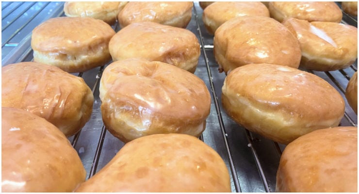 rack of glazed donuts