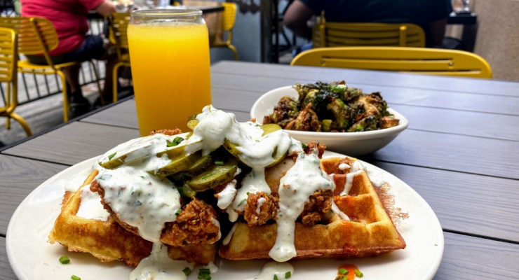 Chicken and waffles -with a mimosa at Tupelo Honey Cafe