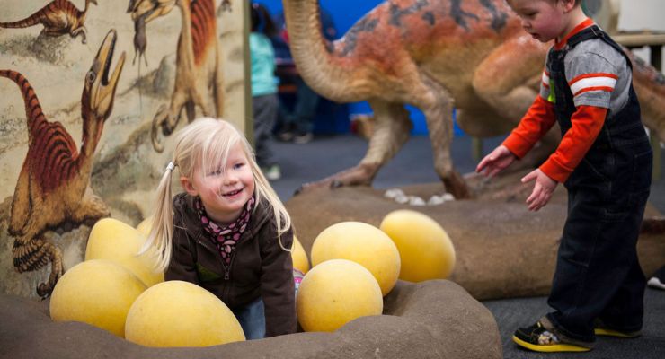 Children play at Dinosaurs: Fire and Ice