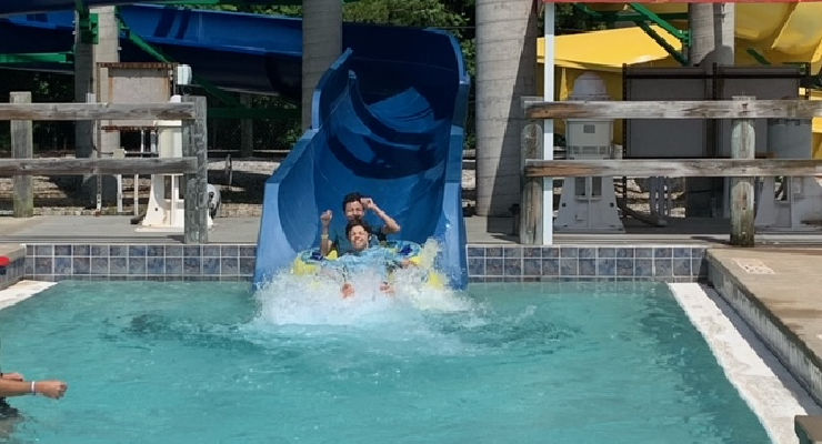 Kids on the tube slide at Discovery Island
