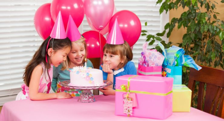 Little girls celebrate a birthday