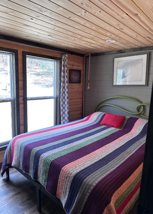 Bedroom in the tiny house at Emberglow