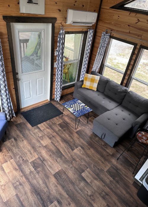 Living room in the tiny house at Emberglow Outdoor Resort