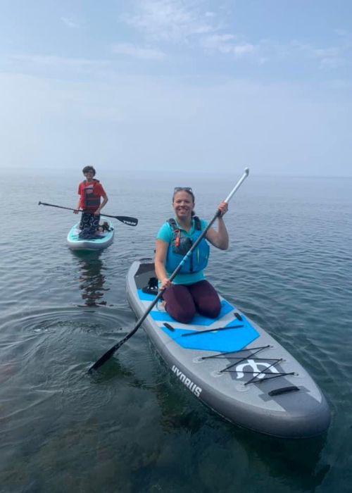 Family paddling on Lake Superior