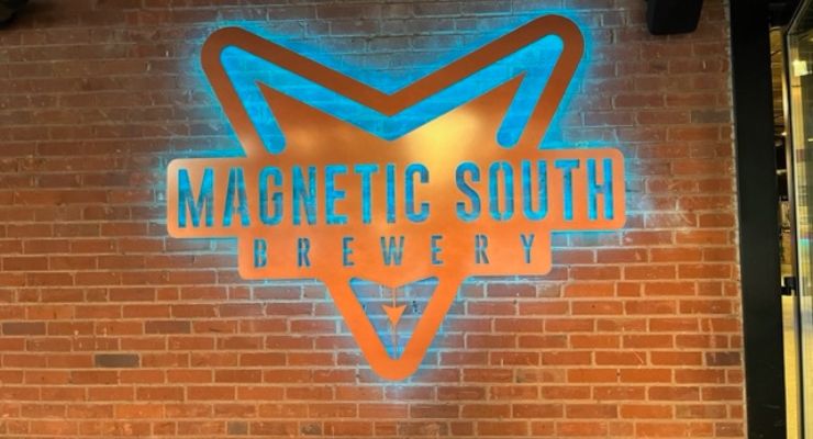 Magnetic south sign