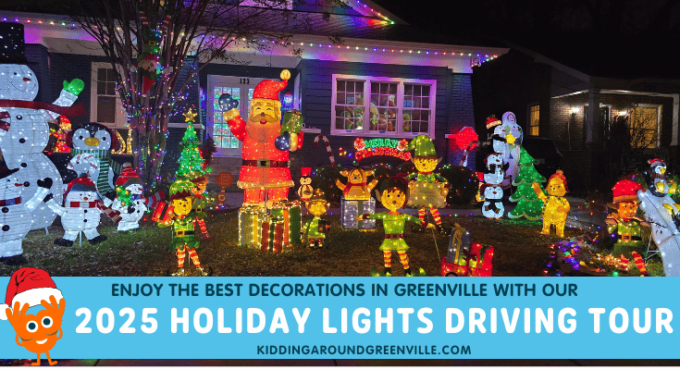 Santa and Christmas light display in Greenville yard during holiday lights tour.