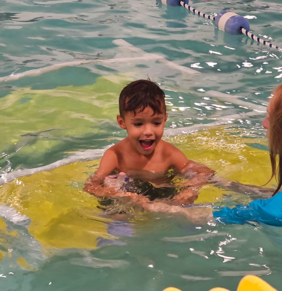 Embler Swim school | Child on Yellow Float