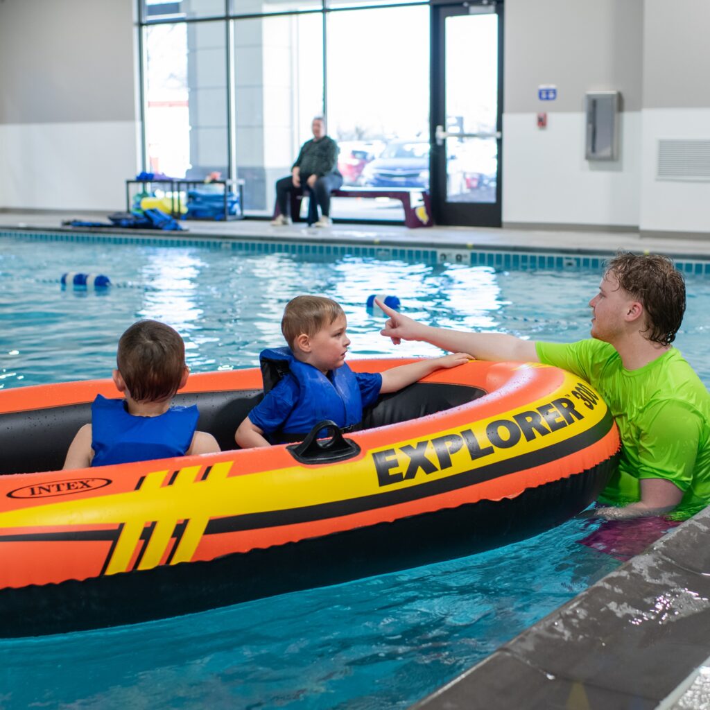 Embler Swim school | Children on raft