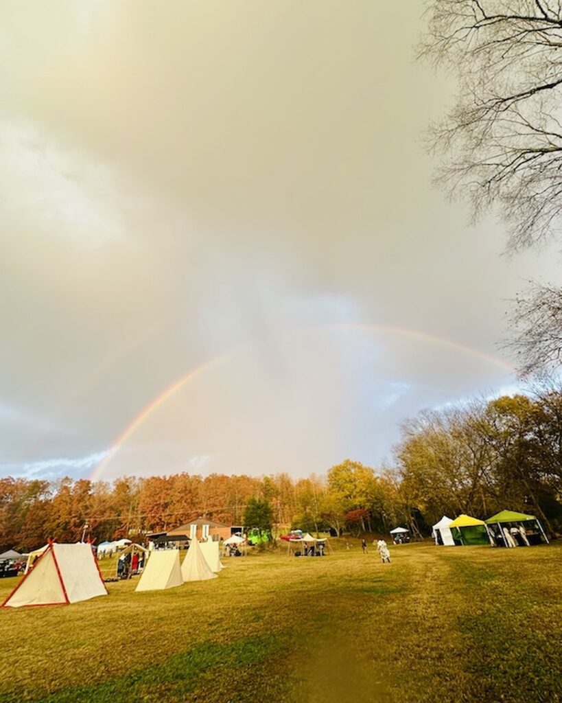 Rainbow over Hagood Mill Historic Site during Midgard at the Mill festival in Pickens, SC