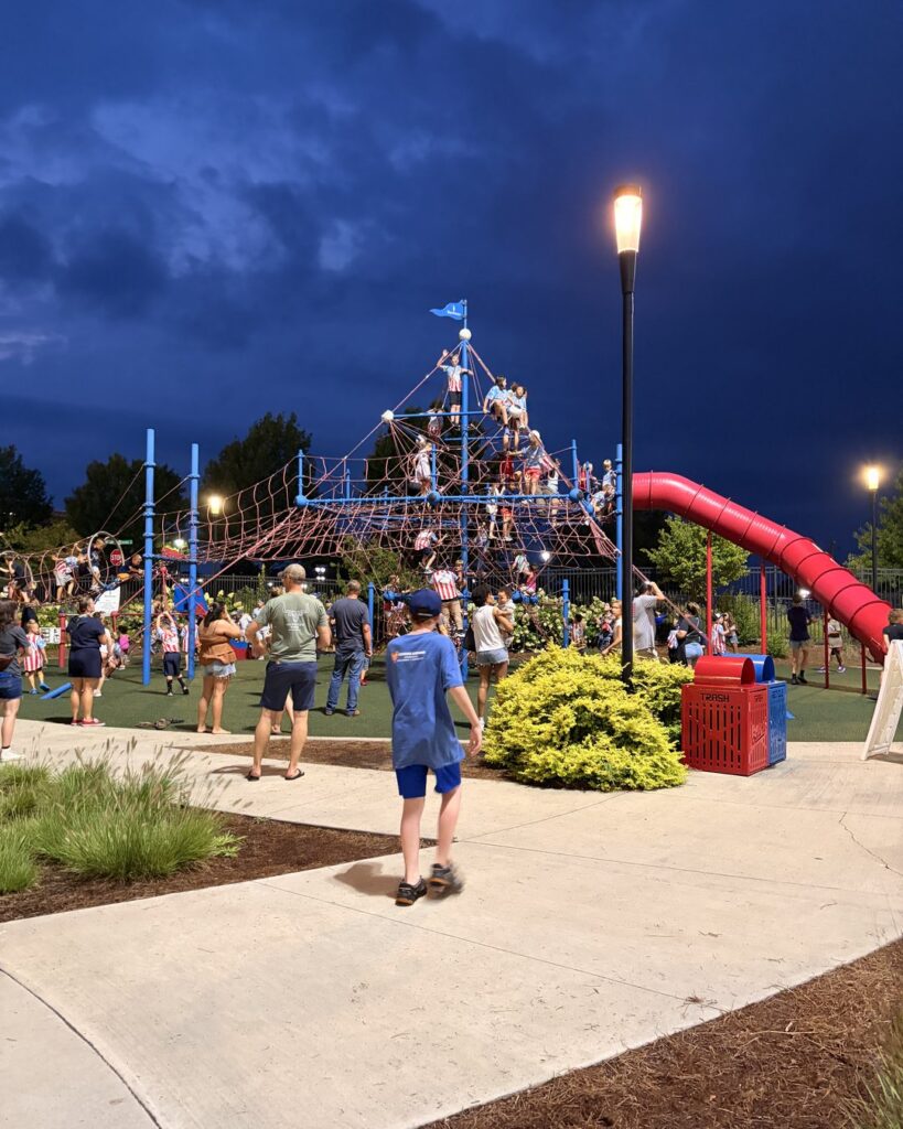 kids play area next to splash pad inside Atrium Health Ballpark in Kannapolis NC