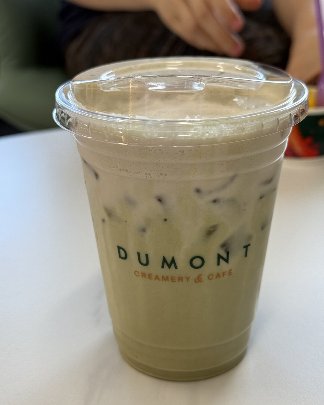 Inside Dumont Creamery & Cafe in Greenville, SC, showing the modern cafe decor and seating area