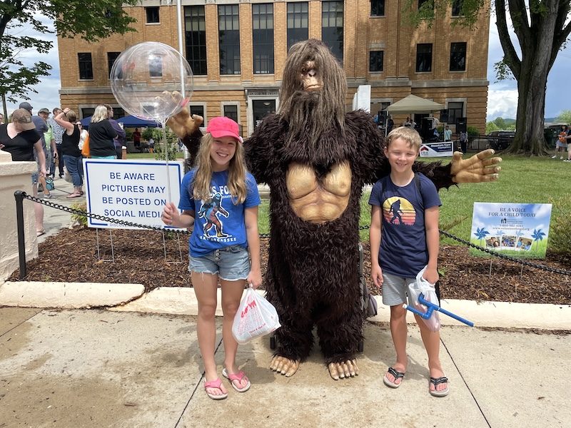 Crowds and vendors at the WNC Bigfoot Festival on Main Street in downtown Marion, NC