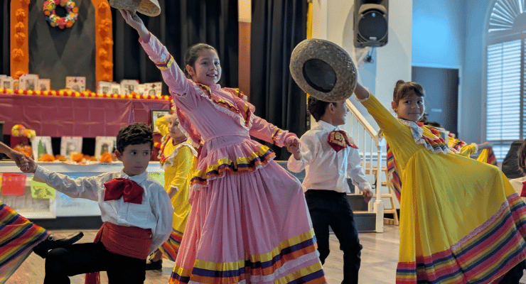Children performing at the Mosaic Dia de los Muertos Celebration in Greenville, SC